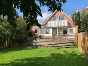 Baumberger Ferienhaus mit Garten & Wintergarten mit 3 Schlafzimmern & 2 Bädern